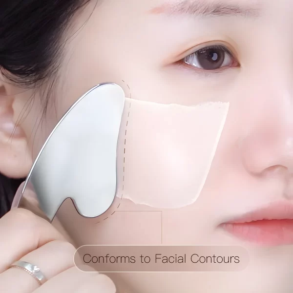 A woman applying foundation with the spatula, showing its smooth contouring capability.