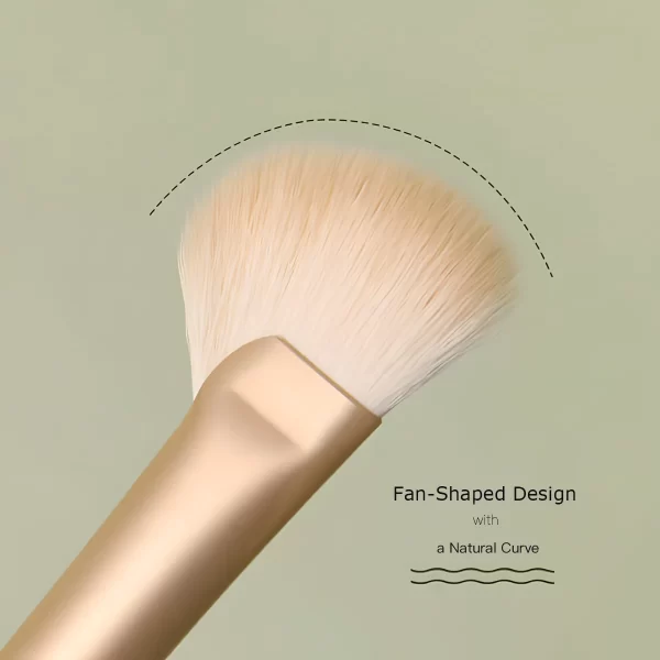 Close-up of fan-shaped nose contour brush with soft bristles, designed for precise nose contouring and natural blending.